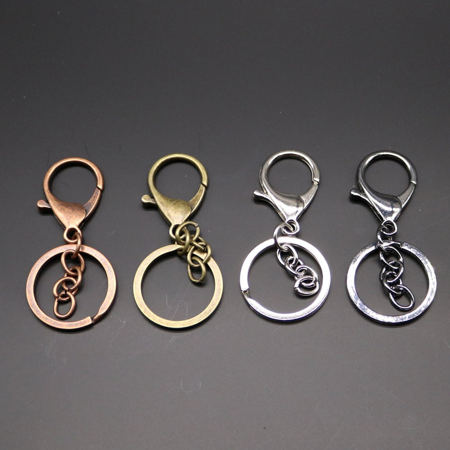 NEW 4 pcs of Samples of HIGH Quality Premade Key Chain Key Fob - 65x30mm 2.5 inch Long- Antique Brass, Antique Copper, Rhodium, Gunmetal