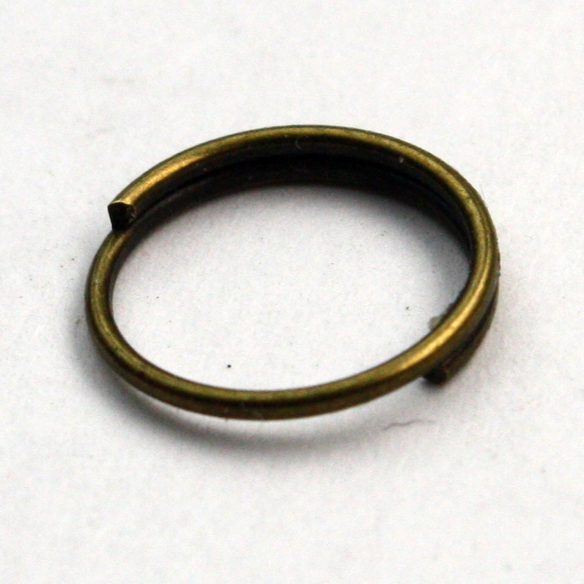 SALE Sale 200 pcs of antiqued brass jumpring 10mm - Jump Ring - 1.5 turn Split Ring