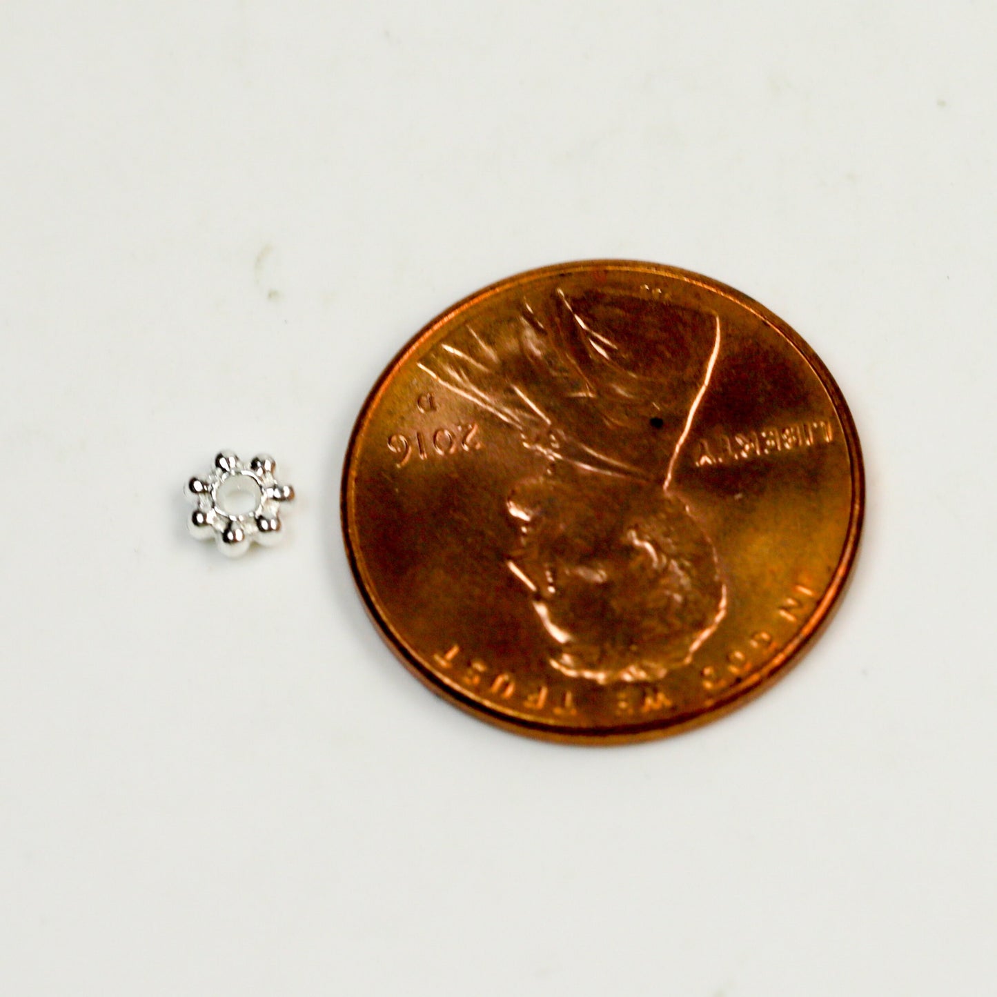 300 pcs of Sterling Silver Plated Daisy Flower Spacer Beads - 4mm