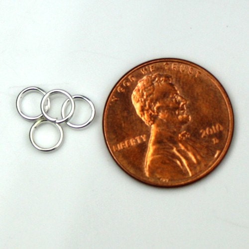1 ounce (about 470 pcs) of Silver finished split rings - 5mmST