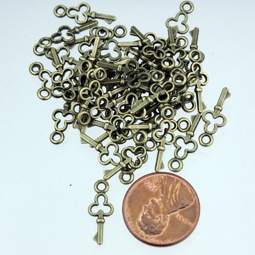 50 pcs of Antiqued Brass finished key charm drop 16.8x6.8mm