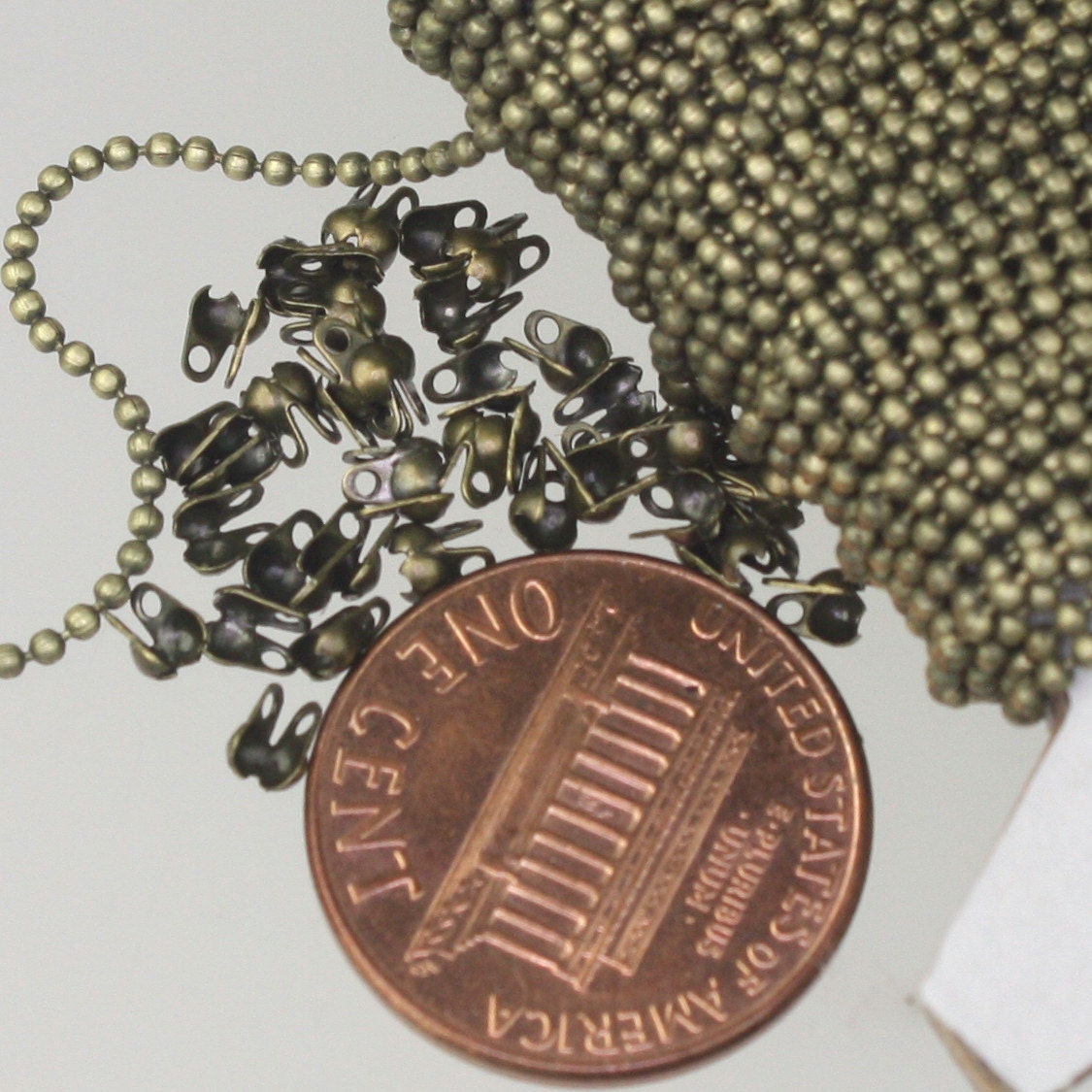 100pcs of Antique Brass Plated ball chain connector for ONLY 1.2mm chain (Crimp type)-shp from CA USA