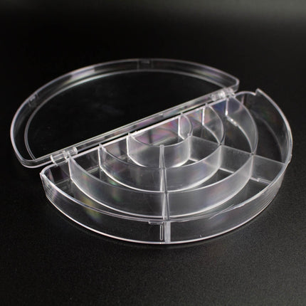 A clear plastic container with multiple compartments, designed to hold and organize various items.
