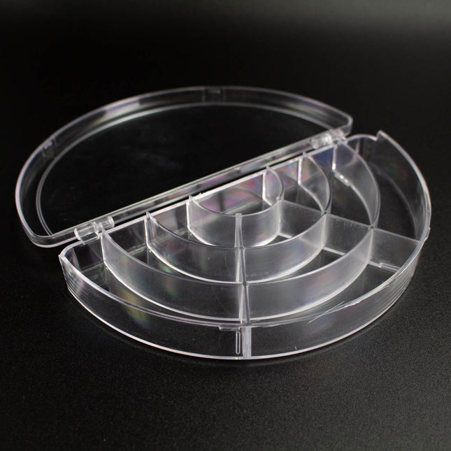 A clear plastic container with multiple compartments, designed to hold and organize various items.