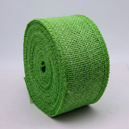 A large, green burlap roll is shown against a white background.