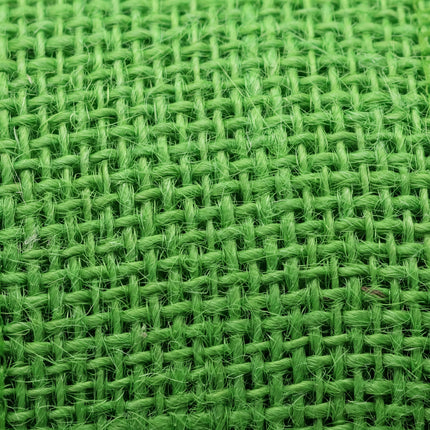 a close-up view of a green, woven fabric with a distinctive criss-cross pattern.