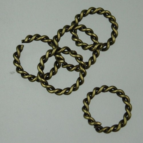 20 pcs of Antique Brass Twisted Wire jumpring 14mm round - 1.6mm thickness