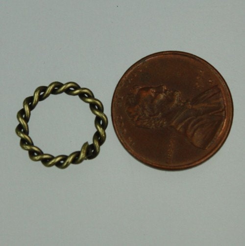 20 pcs of Antique Brass Twisted Wire jumpring 14mm round - 1.6mm thickness