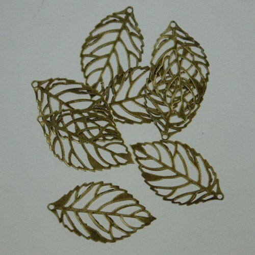 100 pcs of antiqued Brass finished leaf filigree focal 32x18mm