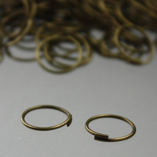 10mm Jump Rings, 100 Antique Brass Jump Rings / Bronze Open 10x0.7mm 21 Gauge 21G Link Connector Open Jump Rings O Ring 7x10mm