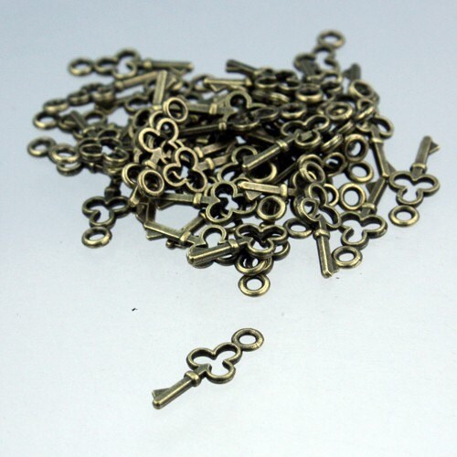 50 pcs of Antiqued Brass finished key charm drop  16.8x6.8mm