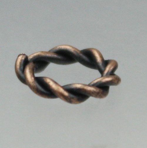 50 pcs of Antique Brass plated Twisted jumpring - 10mm