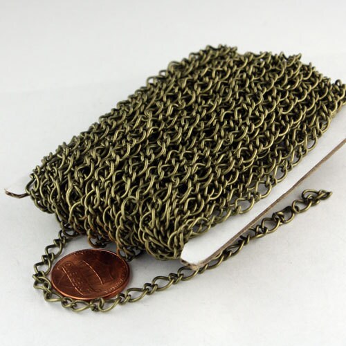 32ft Spool of Antique Brass  Plated Fashion Figaro Long and Short Chain - 6.5x4.3mm 4.0x3.2mm 20Gauge Wire - 6543LS