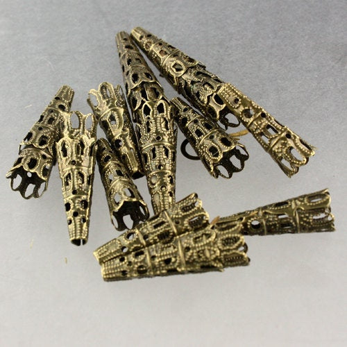 20 pcs of Antique Brass finished filigree cone dangle - 23x9mm