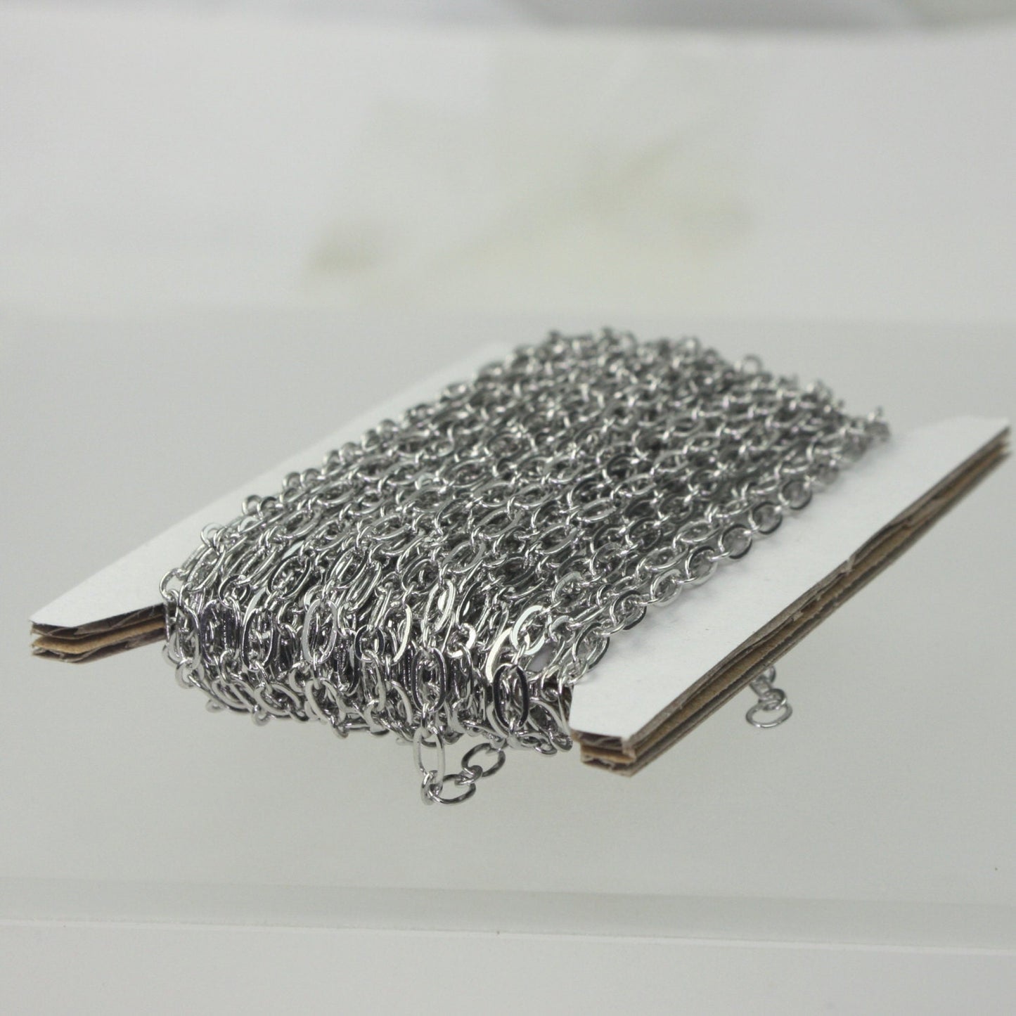 Rhodium Plated Chain bulk , 100 ft spool of (1 and 1) Long and Short Chain SOLDERED Chain   - 6x3mm 4x3mm Soldered 3429LS11