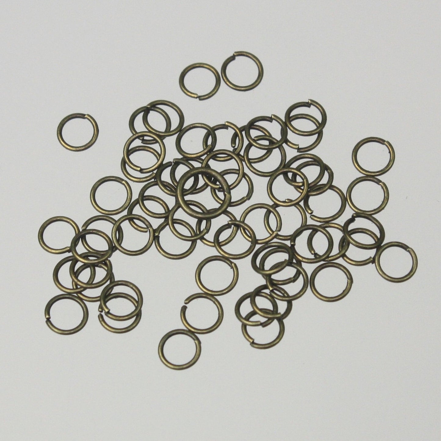4mm Jump Rings, 200 Antique Brass Jump Rings / Bronze Open 4x0.5mm 24 Gauge  Link Connector Open Jump Rings O Ring - 5x4mm
